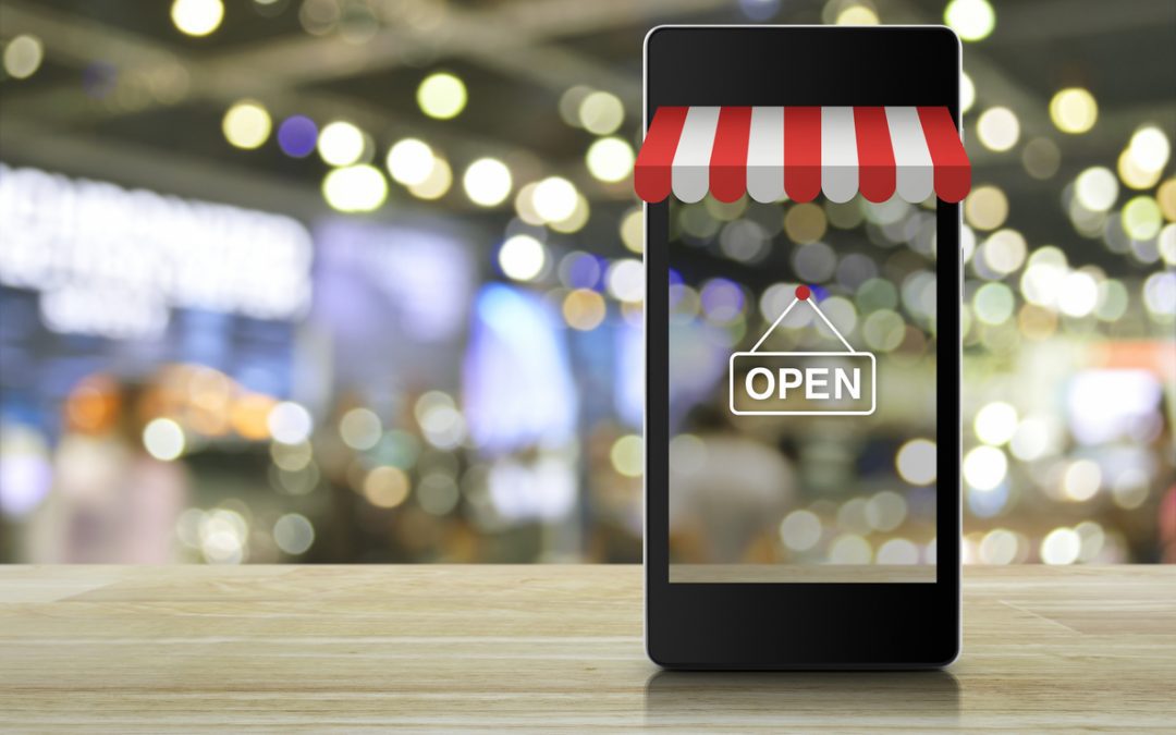 smartphone-standing-upright-displaying-open-sign-with-shop-awning-banners-at-top-ecommerce-concept